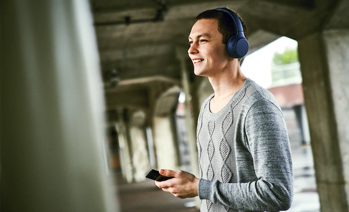 Sony WH-XB700 bluetooth wireless headphones with built-in mic for hands-free calls.